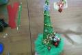 DIY Christmas tree: how to make a beautiful craft from improvised materials and sweets?